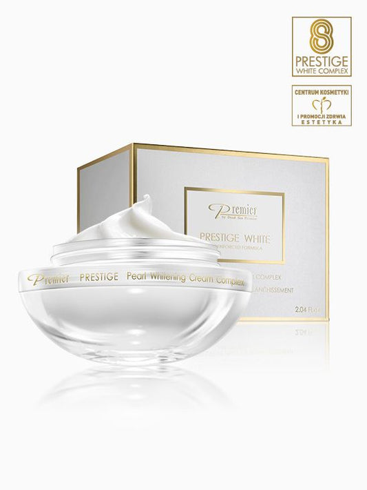 Crema Prestige White Pearl de Premier en tarro blanco abierto junto a su caja blanca y dorada.