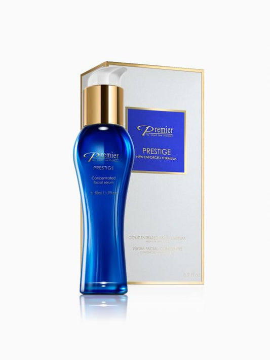 Sérum facial concentrado de Premier Prestige de 50 ml en frasco azul con dosificador dorado y caja blanca.